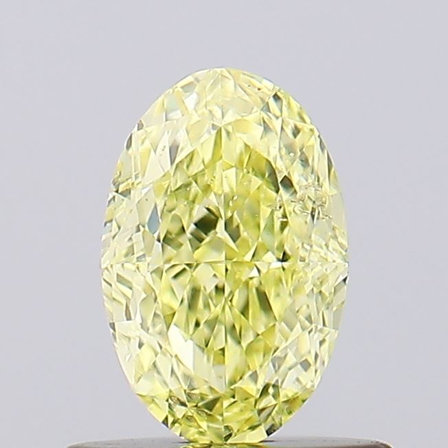 0.70CT SI1 Fancy Yellow Oval Fancy Shape Diamond 6.75*4.4*2.95MM