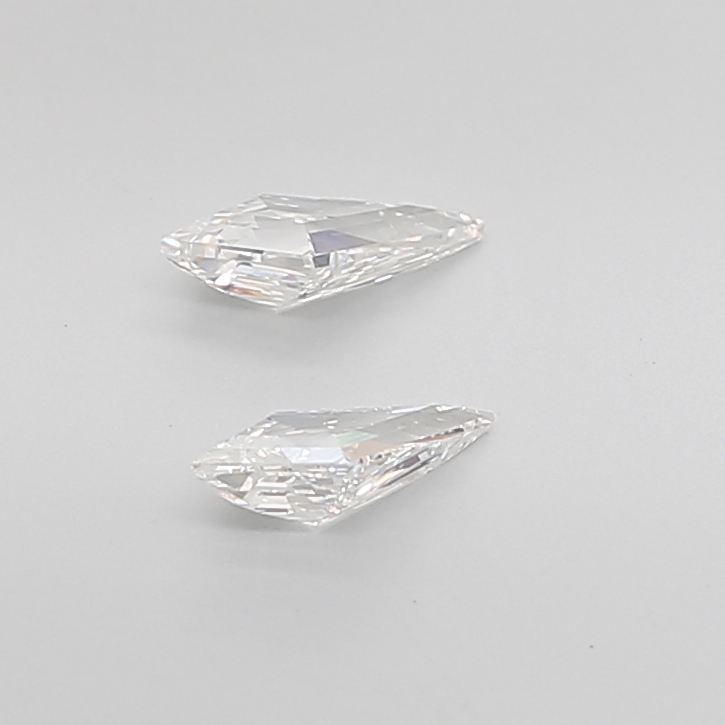0.65 Ct VVS2 G Step Cut Kite Precision Matched Diamond Pair