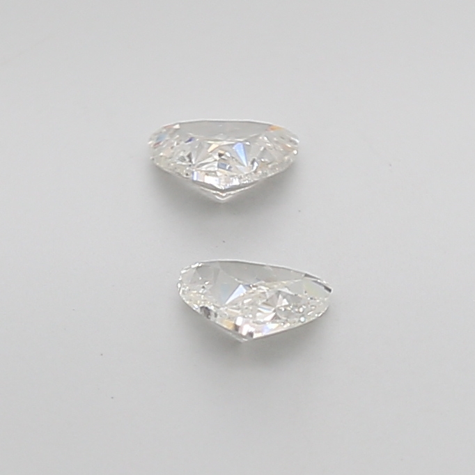 Elegant 0.61 Ct VS2 H Brilliant Trilliant Diamond Pair