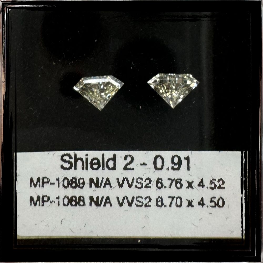 0.91 CT YELLOW VVS2 SHIELD diamond Pairs Inventory