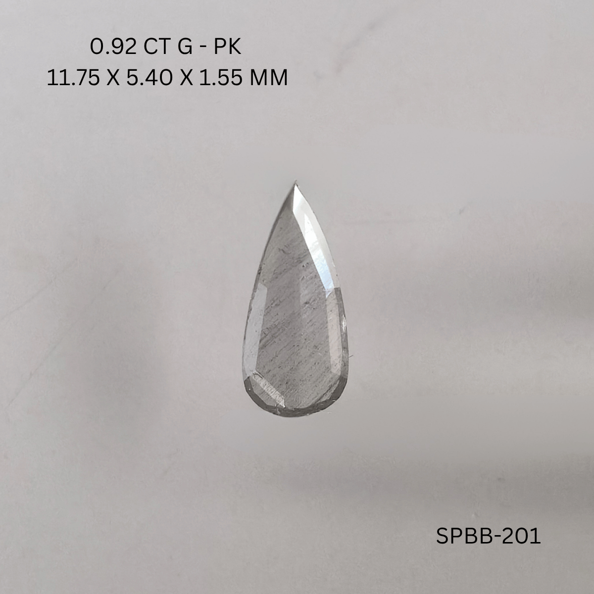 0.92 CT G PK PEAR diamond Salt & Pepper