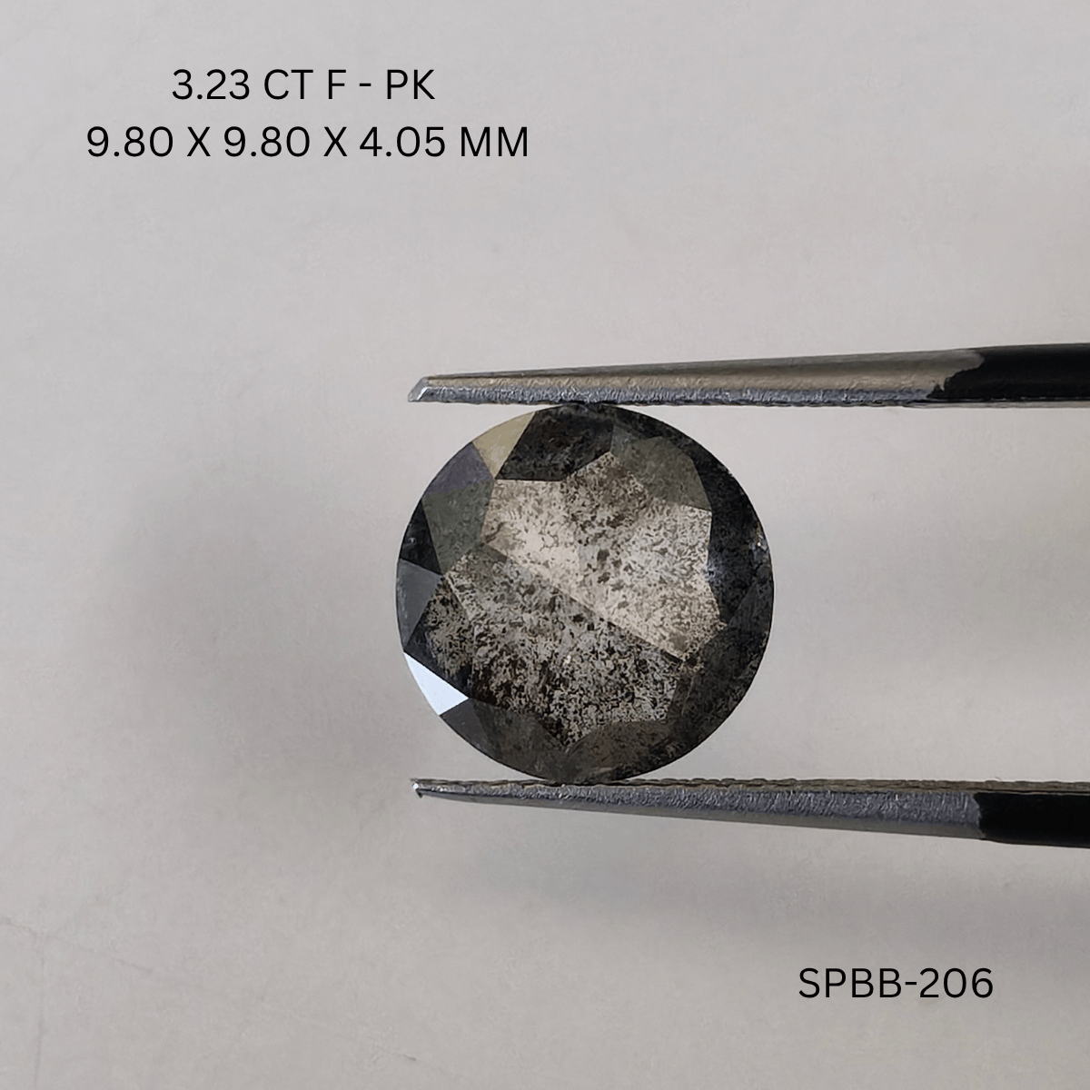 3.23 CT F PK ROUND diamond Salt & Pepper